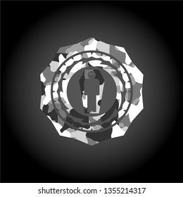 dead man in his coffin icon on grey camouflaged texture