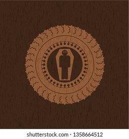 dead man in his coffin icon inside realistic wooden emblem