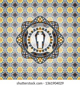 dead man in his coffin icon inside arabesque badge background. arabic decoration.