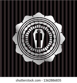 dead man in his coffin icon inside silvery emblem or badge