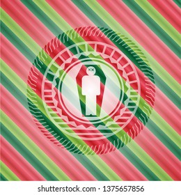 dead man in his coffin icon inside christmas colors emblem.