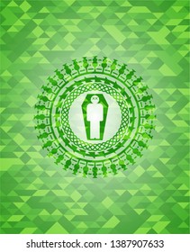 dead man in his coffin icon inside green emblem with mosaic background