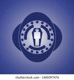 dead man in his coffin icon inside jean or denim emblem or badge background