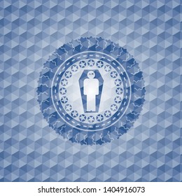 dead man in his coffin icon inside blue badge with geometric pattern background.