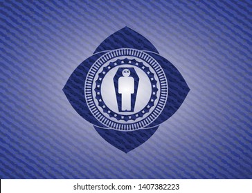dead man in his coffin icon inside emblem with denim texture
