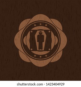 dead man in his coffin icon inside wooden emblem. Vintage.