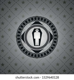 dead man in his coffin icon inside dark emblem. Retro