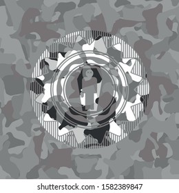dead man in his coffin icon on grey camouflaged texture