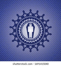 dead man in his coffin icon inside emblem with jean texture