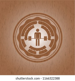 deadlift icon inside badge with wood background