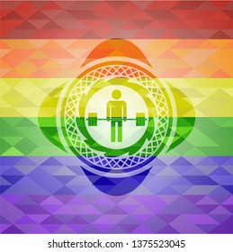 deadlift icon inside emblem on mosaic background with the colors of the LGBT flag