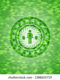 deadlift icon inside green emblem with triangle mosaic background