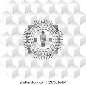 deadlift icon inside grey emblem with geometric cube white background