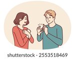 Deaf-mute man and woman are talking using sign language and demonstrating symbols with hands. Guy teaches girl sign language for concept of inclusiveness and socialization of people with disabilities