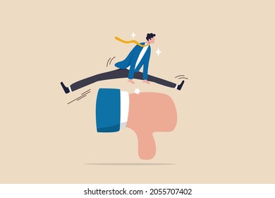 Deal with negative feedback, criticism or blame, ignore bully or failure, overcome difficulty to success in work, confidence businessman jump over critic thumb down feedback to achieve business goal. - Shutterstock ID 2055707402