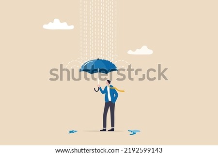 Dealing with bad luck, problem or depression, protect from business mistake, error or economic recession, security or insurance concept, confident businessman with umbrella to protect from rain storm.