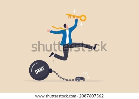Debt free or freedom for pay off debts, loan or mortgage, solution to solve financial problem, savings or investment to break free, happy businessman holding golden key after unlock debt burden chain.