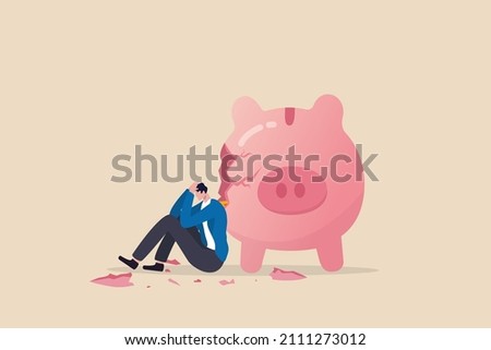 Debt and loan problem, financial mistake, poverty or bankruptcy concept, depressed businessman sitting with broken piggy bank.