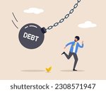 Debt problem concept. Obligation or financial loan crisis, liability or credit failure, no money to pay for debt, mortgage default, business man run away from heavy wrecking ball with the word debt.