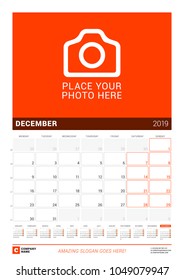 December 2019. Wall calendar for 2019 year. Vector design print template with place for photo and year calendar. Week sarts on Monday