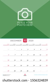 December 2020. Wall calendar planner with place for photo. Vector design print template. Week starts on Sunday