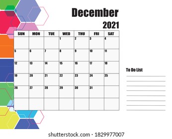 December 2021 Calendar, white background on the left, hexagons of various sizes and colors