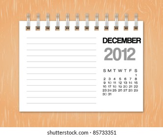 December calendar 2012 on wood background