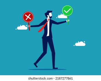 The decision is right or wrong. Businessman holding right and wrong sign