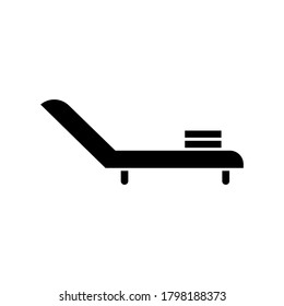 Deck chair black glyph icon. Chaise lounge for relaxation on rooftop. Armchair for sunbathing. Reclining chair for tanning and relaxing. Silhouette symbol on white space. Vector isolated illustration