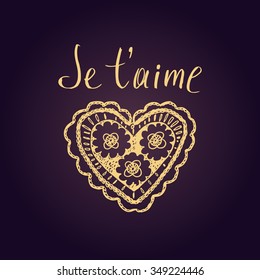 Declaration of love in French. Openwork heart, drawn by hand. Je t'aime lettering. I love you. Valentine's Day love message