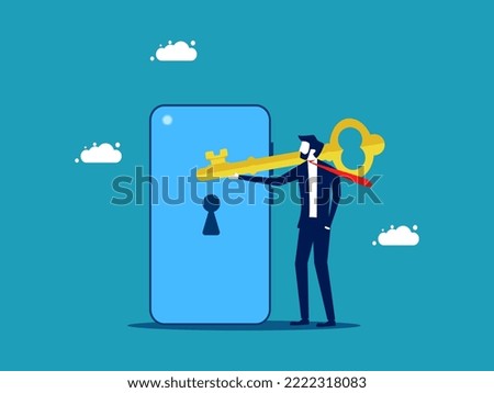 Decode or unlock. businessman holding a key to unlock a smartphone