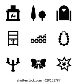 Decor icons set. set of 9 decor filled icons such as wardrobe, bow, fireworks, garland, fireplace, tree, candlestick, brick wall