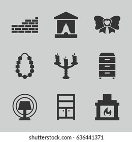 Decor icons set. set of 9 decor filled icons such as wardrobe, bow, nightstand, garland, fireplace, candlestick, table lamp, brick wall