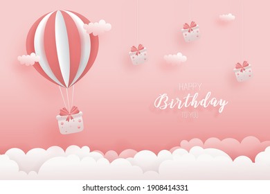 Decorated birthday card delivery with hot air balloon beautiful gift box in paper style. gift box hanging on the wall decorated with clouds. with clouds. Sweet pink background. Vector illustration