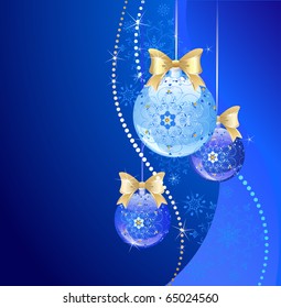 decorated by an original pattern, blue transparent new-year ball and two dark blue ball on a dark blue background with snowflakes