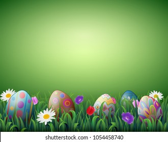 Decorated Easter eggs in a green grass background