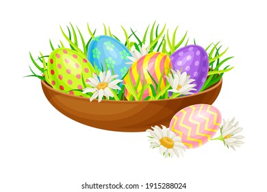 Decorated Easter Eggs or Paschal Eggs Rested in Wooden Bowl with Green Grass with Spring Flowers Vector Arrangement