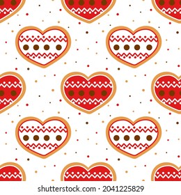 Decorated hearts traditional baked goods seamless pattern. Background with decorated hearts and colorful dots. Template for festive packaging, wallpaper, fabric and New Year's decor.