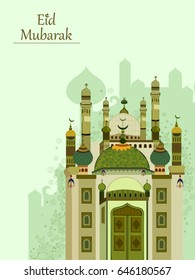 Decorated mosque in Eid Mubarak (Happy Eid) background in vector