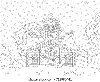 Decorated small wooden tower covered with snow on Christmas