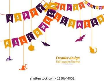 decorating the flag that reads happy halloween with accessories hanging on a white background