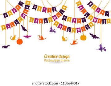 decorating the flag that reads happy halloween with accessories hanging on a white background