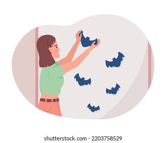 Decorating wall with flying bats 2D vector isolated illustration. Girl adorning house for Halloween flat character on cartoon background. Colourful editable scene for mobile, website, presentation