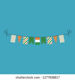 Decorations bunting flags for Ivory Coast national day holiday in flat design. Independence day or National day holiday concept.