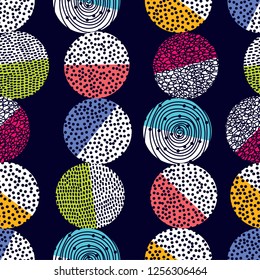 Decorative abstract polka dots in the style of the 60s. Cheerful polka dot vector seamless pattern. Can be used in textile industry, paper, background, scrapbooking.