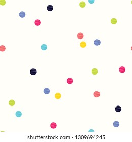 Decorative abstract polka dots in the style of the 60s.
 Cheerful polka dot vector seamless pattern. Can be used in textile industry, paper, background, scrapbooking.