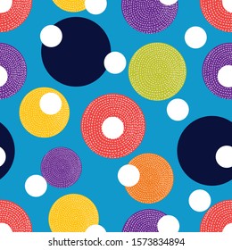 Decorative abstract polka dots in the style of the 60s.
 Cheerful polka dot vector seamless pattern. Can be used in textile industry, paper, background, scrapbooking.