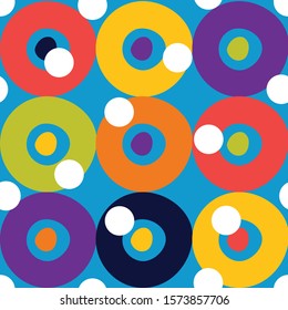 Decorative abstract polka dots in the style of the 60s.. Cheerful polka dot vector seamless pattern. Can be used in textile industry, paper, background, scrapbooking.