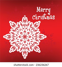 Decorative abstract snowflake on red background