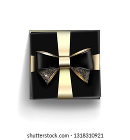 Decorative black gift box with golden bow and long ribbon. Vector illustration